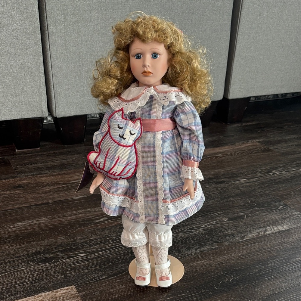 Porcelain Doll with Cat Accessory